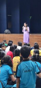 Addressing a group of 350 kids