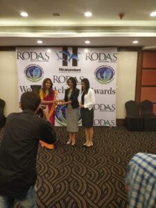 Giving the Award to Atiqa Farooqi